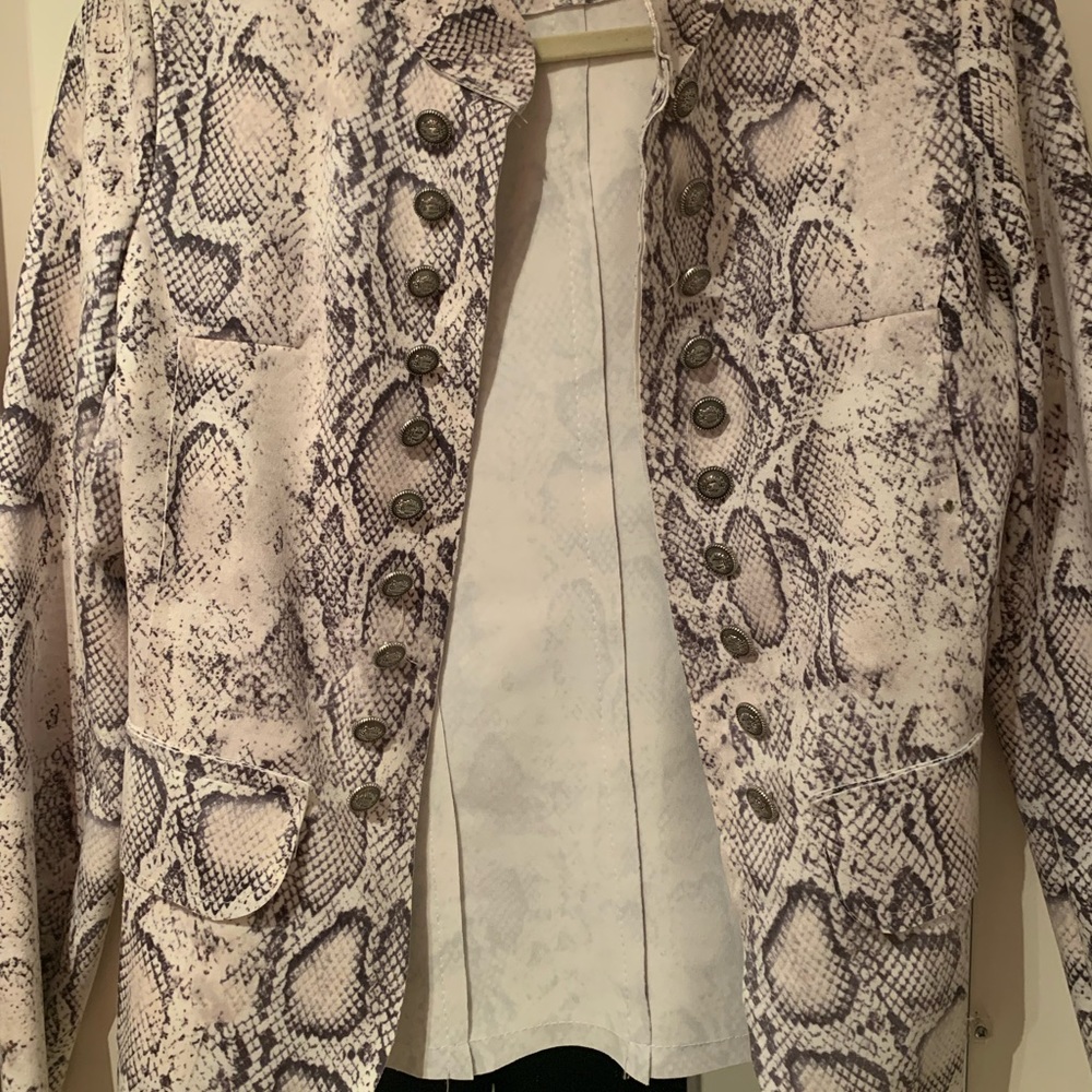 Military style print jacket. Classy yet funky.